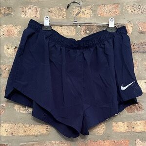 Nike Women's Dark Blue Athletic Shorts with open sides and briefs